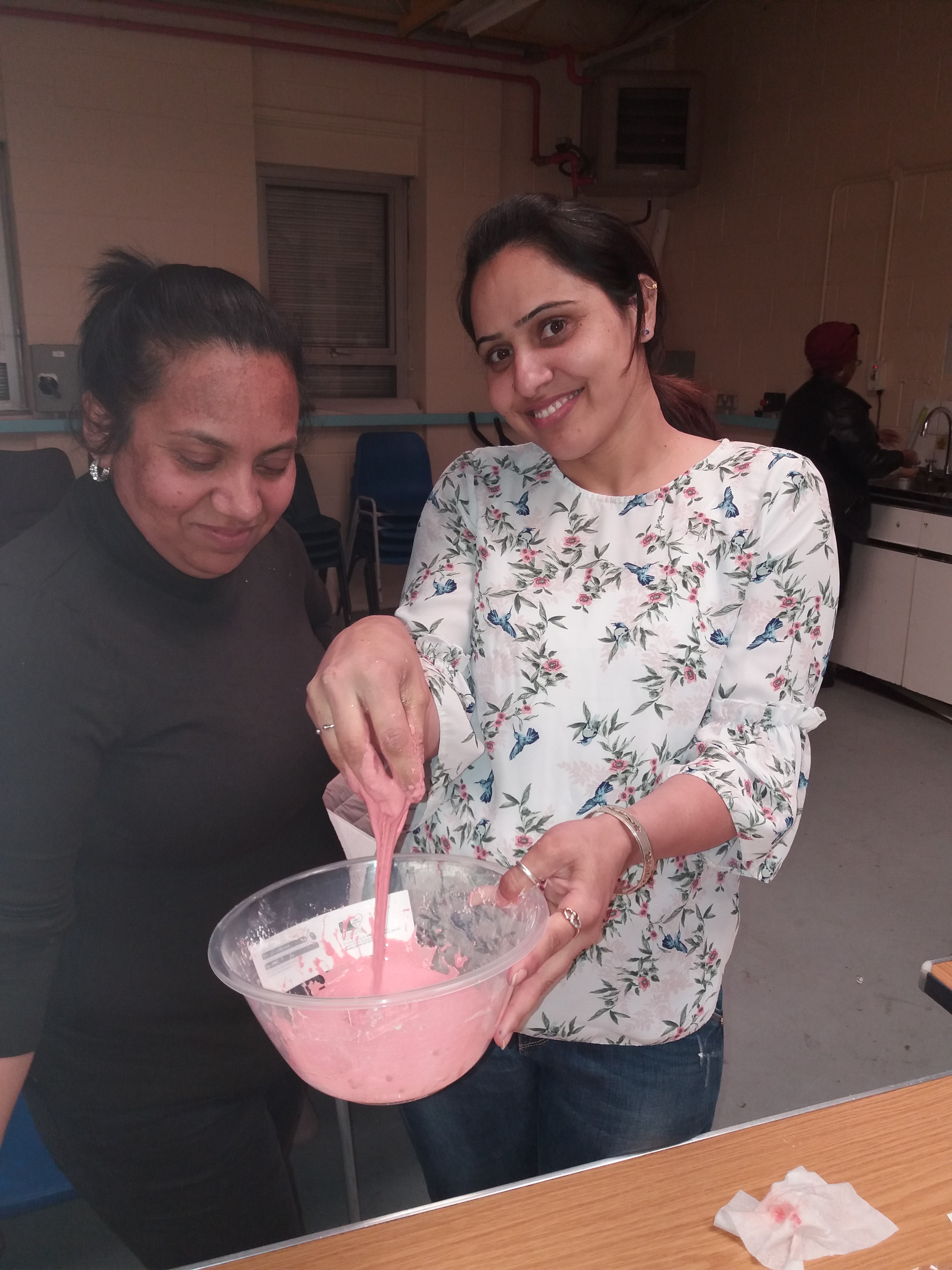 Learners playing with gloop