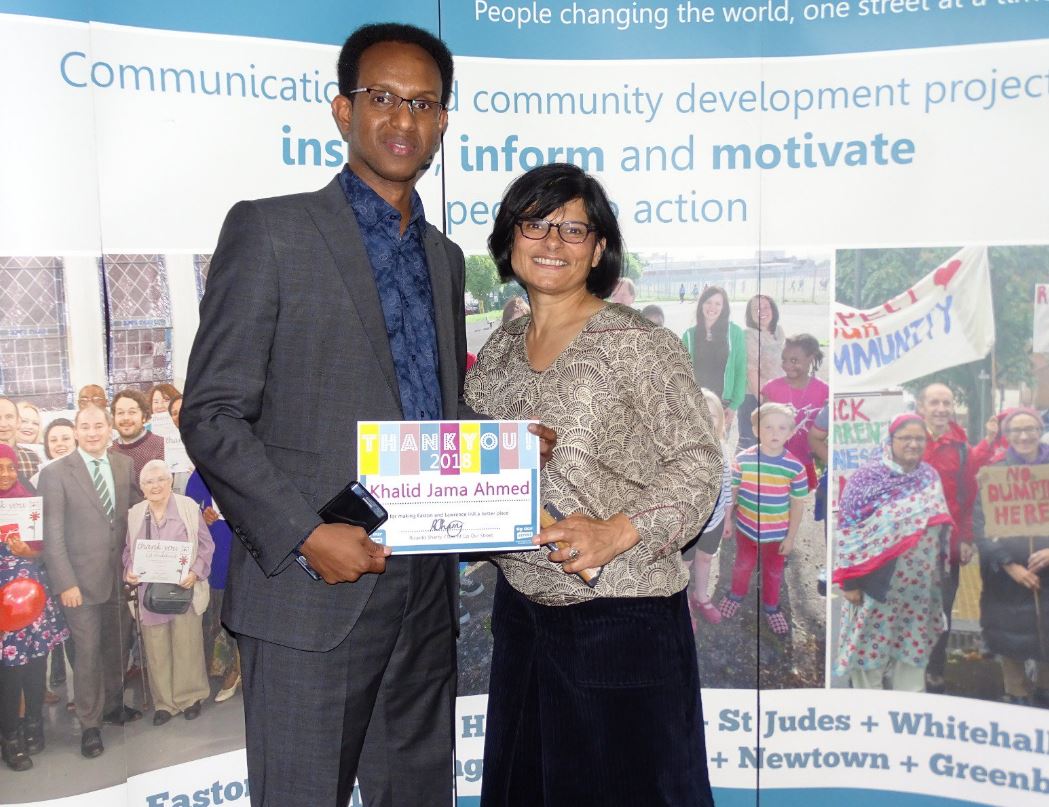 Khalid receiving a Thank You Award from Thangam Debbonaire MP