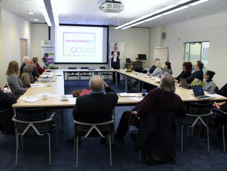 Coventry roundtable talking about refugees and community housing