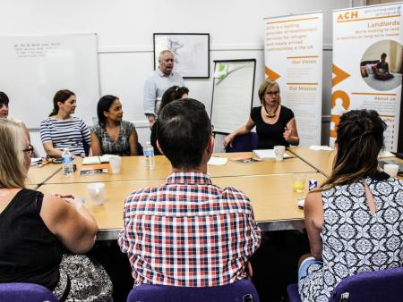 Tai Pawb visit and talking about refugee inequality in housing