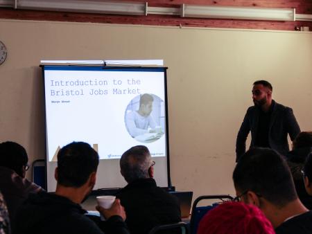 Marghoob Ahmad presents at the Bristol workshop for asylum seekers