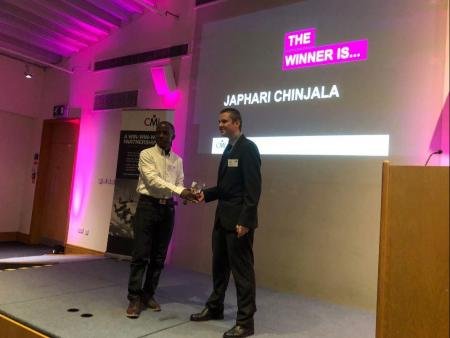 Matt Rogers presenting Japhari Chinjala with a GPD Award in Coventry