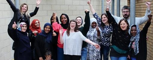 Cheering to celebrate a well run refugee and migrant training course in Bristol