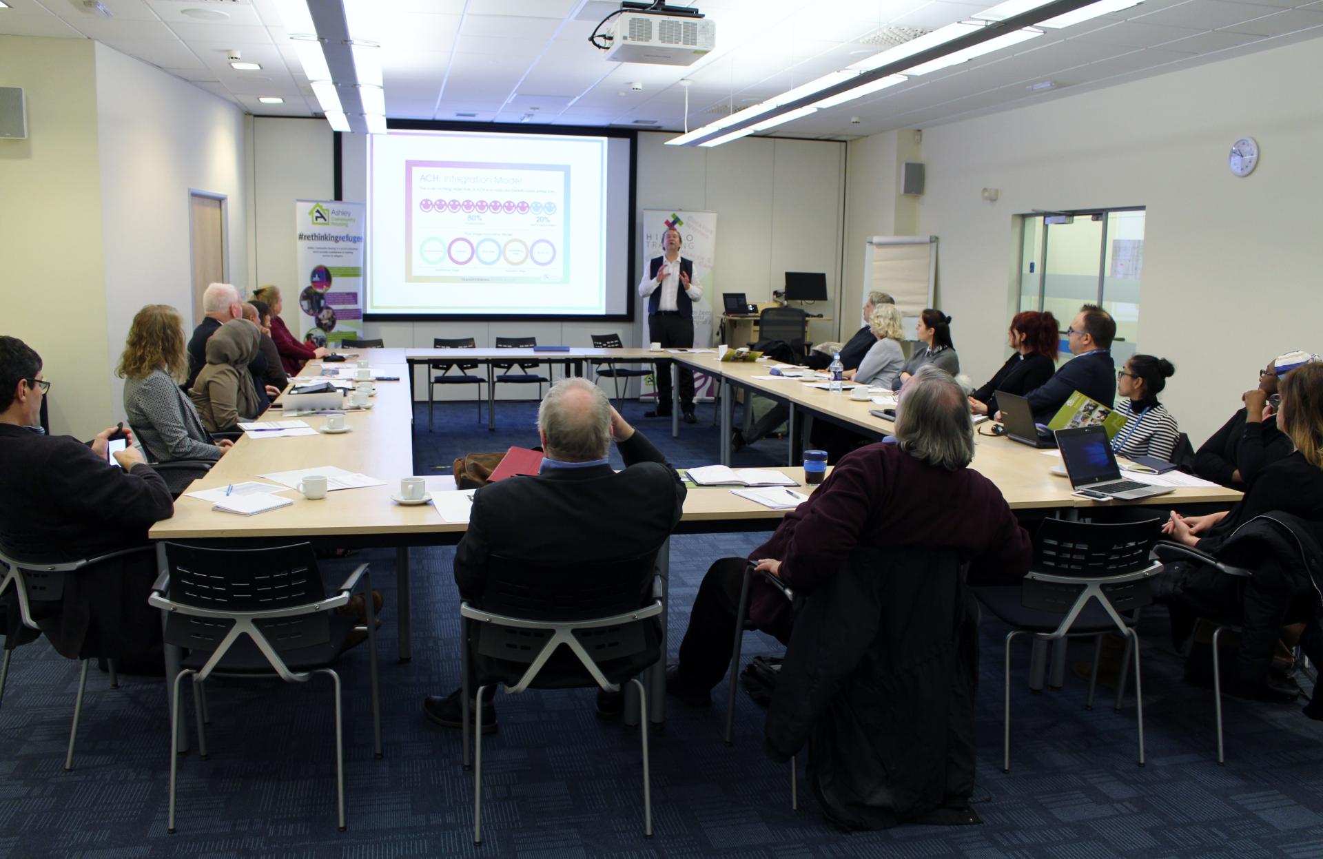 Coventry roundtable talking about refugees and community housing