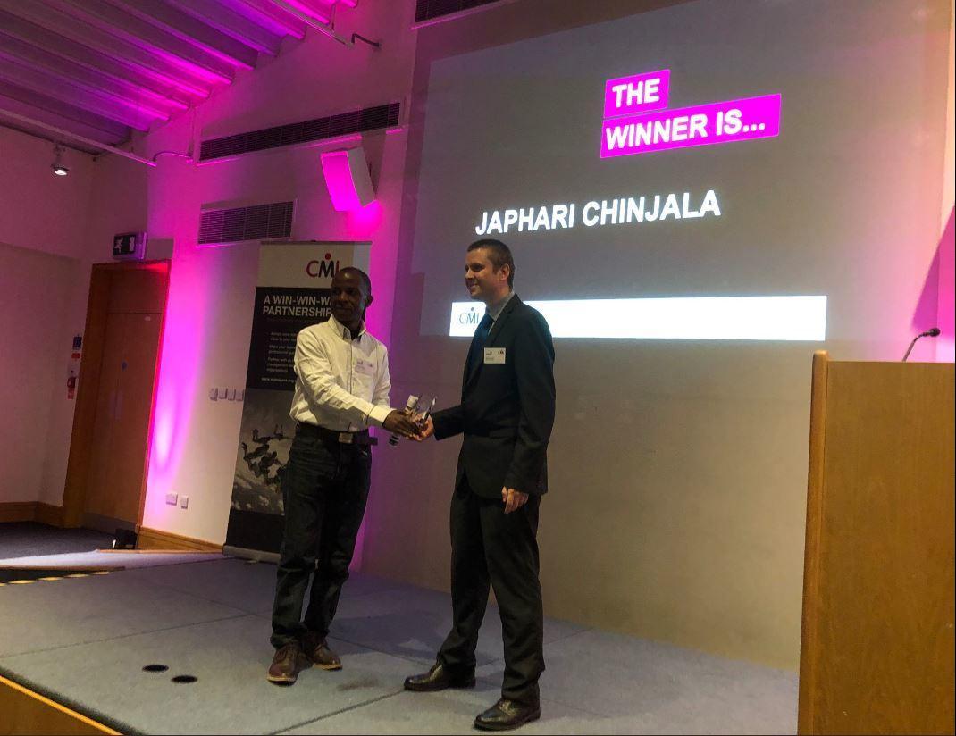 Matt Rogers presenting Japhari Chinjala with a GPD Award in Coventry