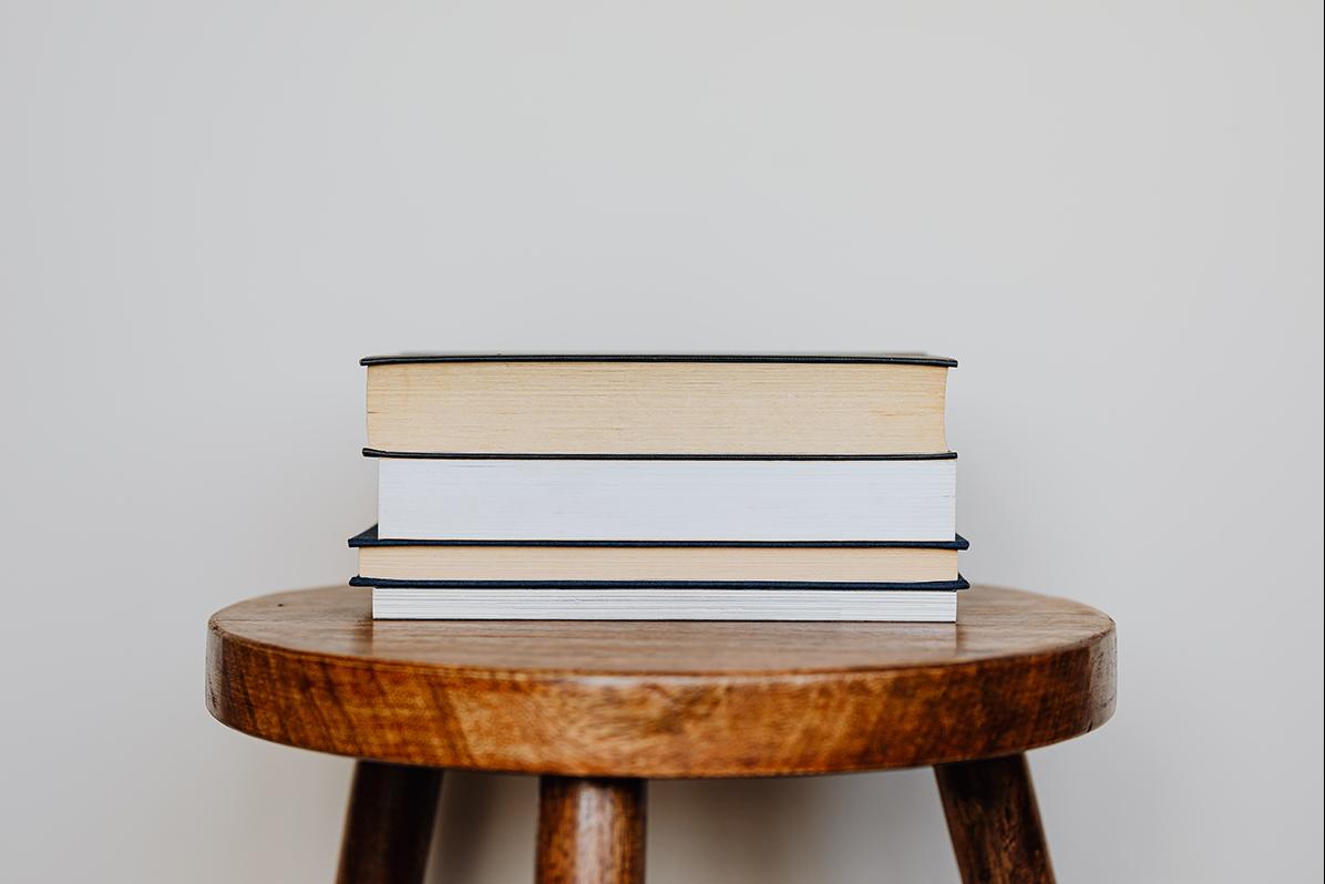 Books sitting on a chair